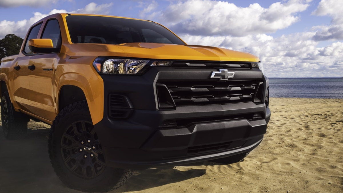 2026 Chevrolet Colorado parked on a beach, front three-quarter view