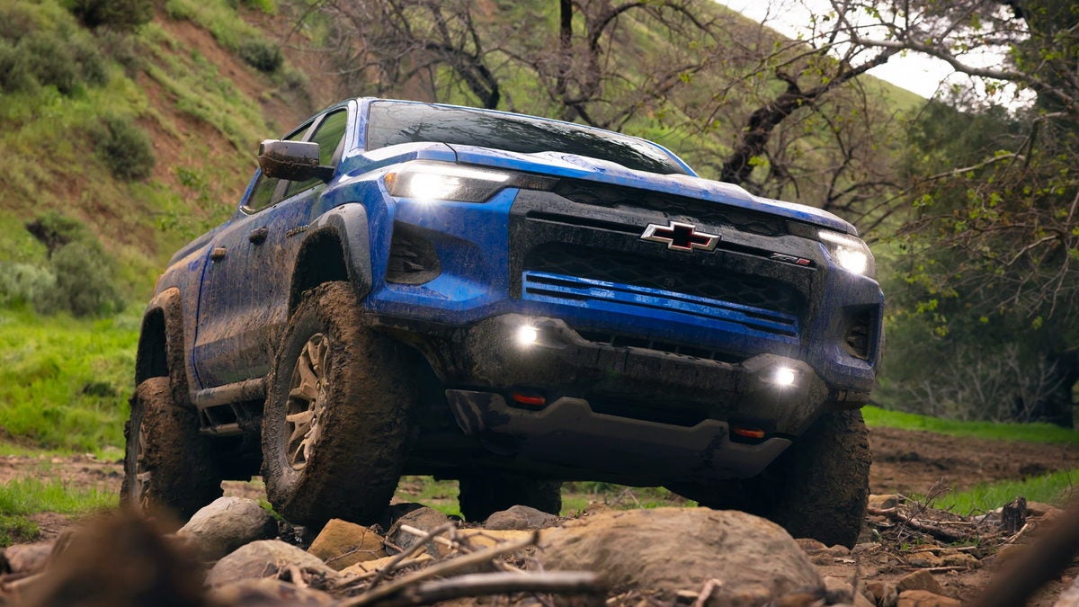 2026 Chevrolet Colorado ZR2 climbing rocks on 33-inch mud-terrain tires