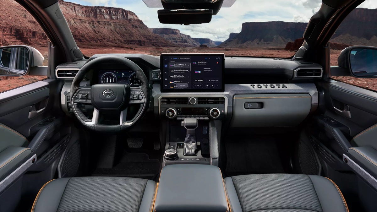 2026 Toyota Tacoma dashboard with the available 14-inch touchscreen